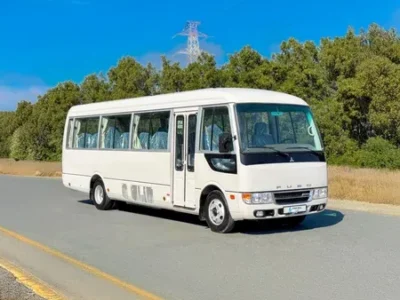 Toyota Coaster 2024 — Abu Dhabi